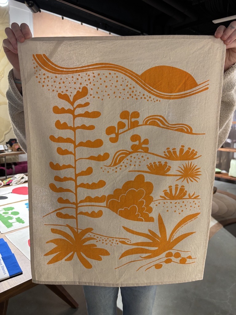 photo of someone holding agave tea towel