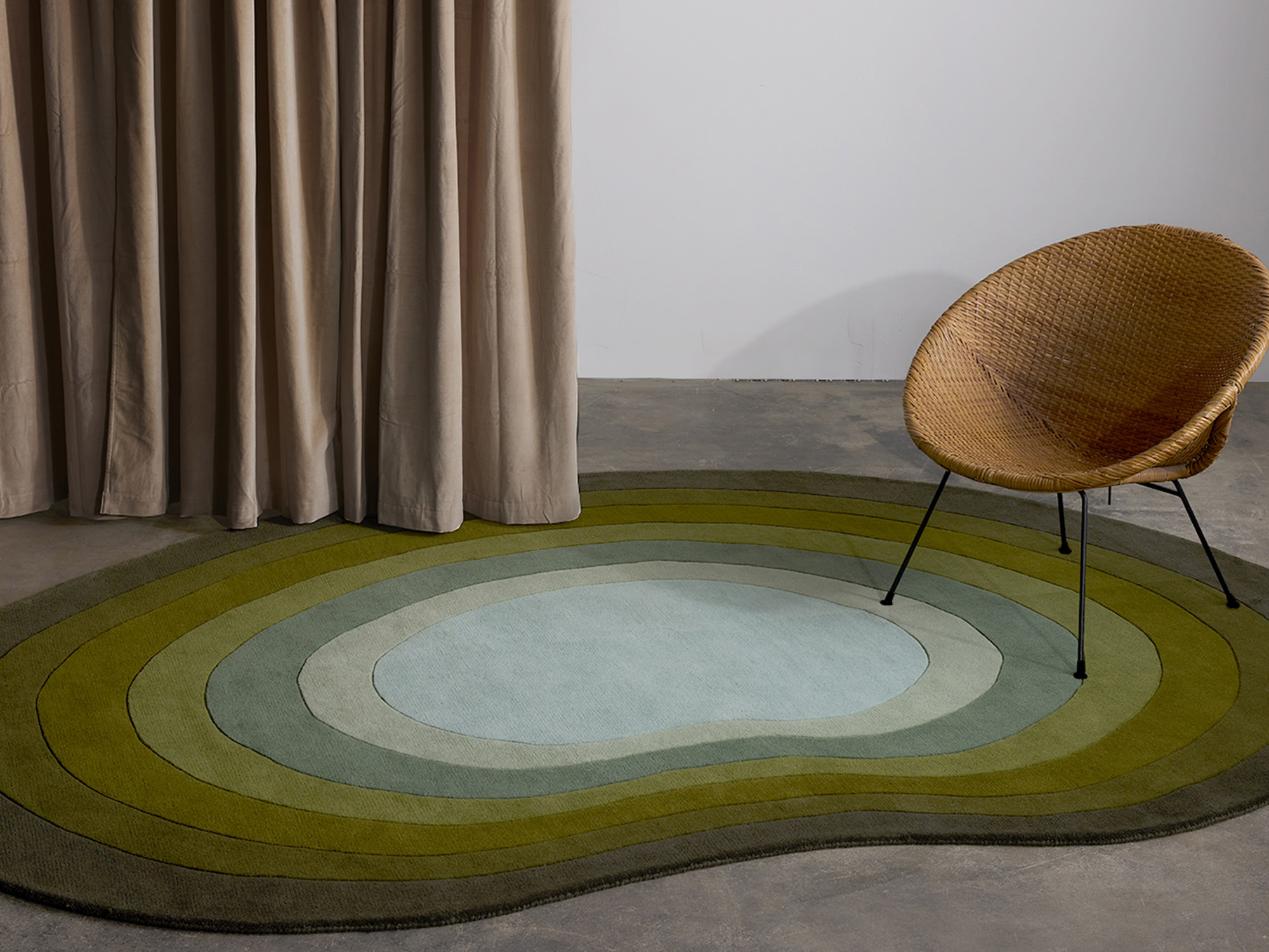 A pool shaped rug called Pool Wooland