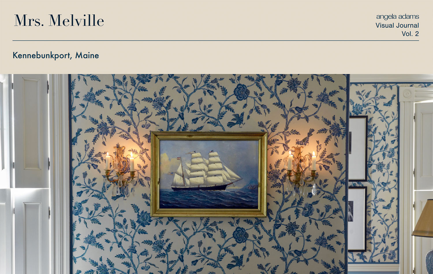 Blue wallpaper with gold framed picture on the wall.
