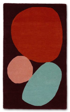 A 3 foot by 5 foot modern rug called Three Stones Rust
