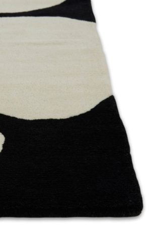 A detail of Angela Adams Astrud Coconut area rug